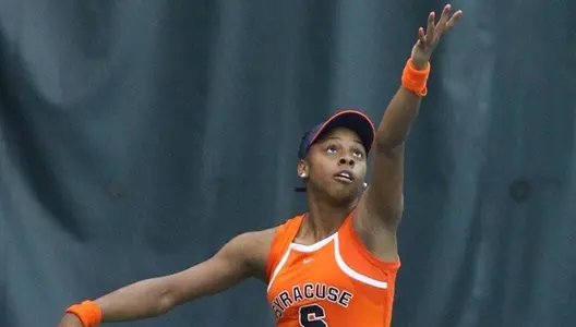 Aleah Marrow serves in singles.