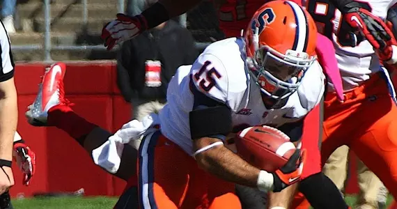Alec Lemon breaks a tackle.