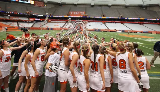 The Orange prepare to take the field.
