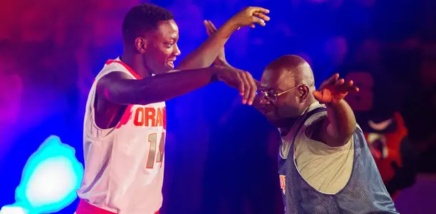 Kaleb Joseph is greeted by Pearl Washington.