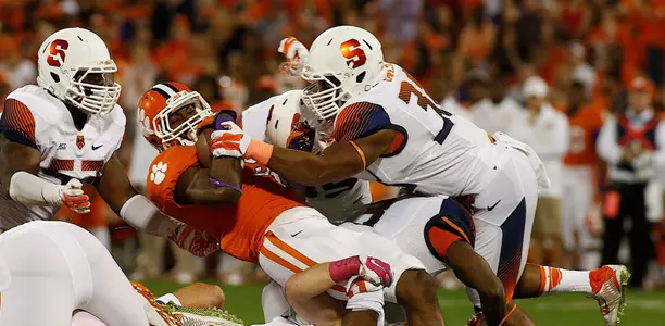 Cameron Lynch takes down a Clemson ball carrier.