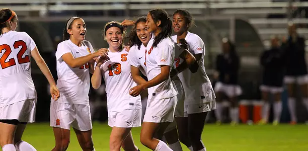 Orange celebrates a goal against Boston College.