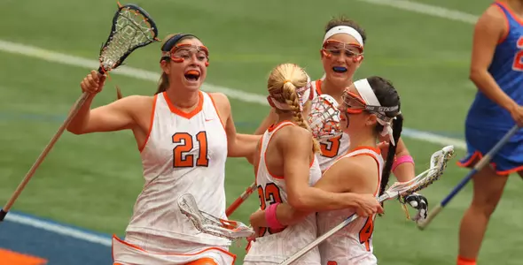 Orange celebrates a goal.