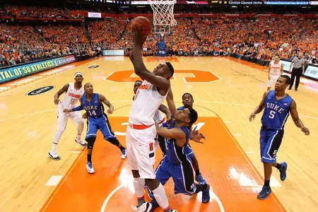 Jerami Grant battles to the net.