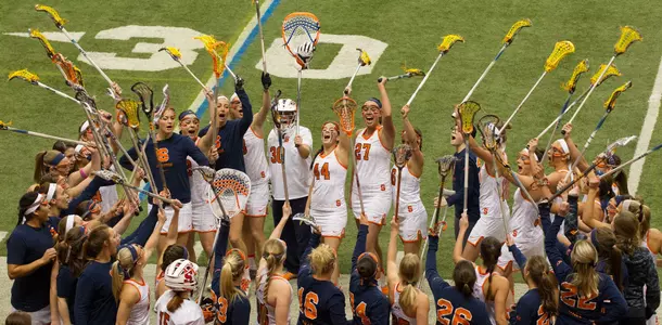 The Orange prepare to take the field.