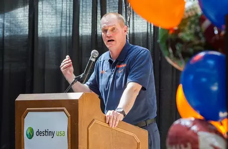 Orange football coach Scott Shafer speaks to those in attendence.