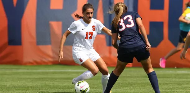 Alexis Koval takes on her defender.