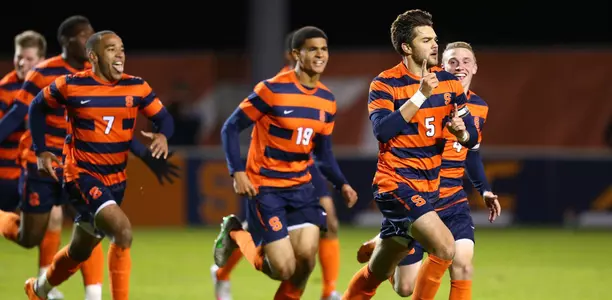 Louis Cross celebrates his go-ahead goal against NC State.