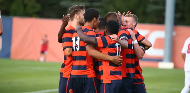 The Orange celebrates a goal against the Cardinals.