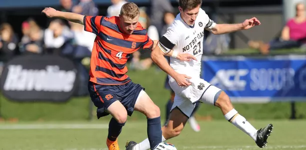 Liam Callahan battles for possession in the ACC Tournament final.