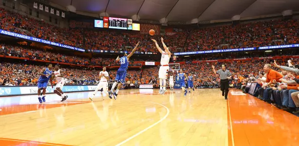 Trevor Cooney shoots a three against the Blue Devils.