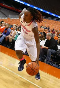 Tiara Butler drives the ball.