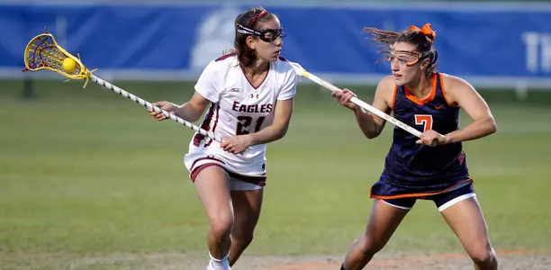 Brenna Rainone defends Caroline Margolis in the ACC Tournament quarterfinals.