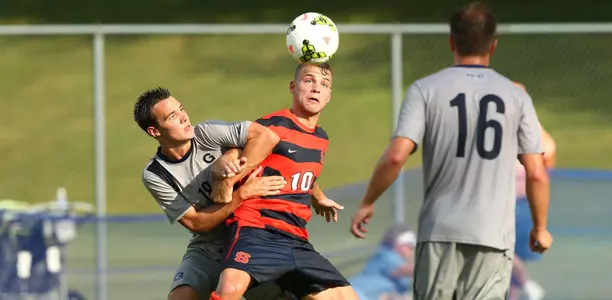 Julian Buescher battles for the ball against the Hoyas.