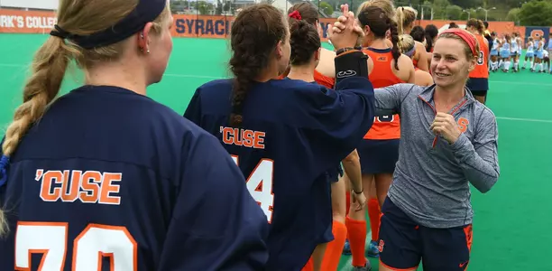 Head coach Ange Bradley greets the team pre-game.