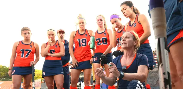Coach Bradley with the team during a time-out.