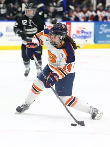 Savannah Rennie shoots.