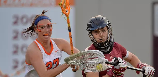 Kelly Cross tries to prevent a Boston College clear in the ACC Tournament quarterfinals.