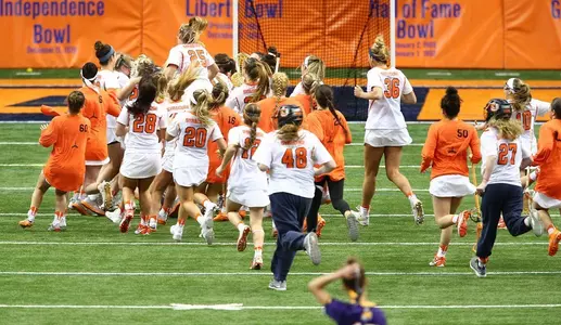 The Orange celebrate the win over Albany.