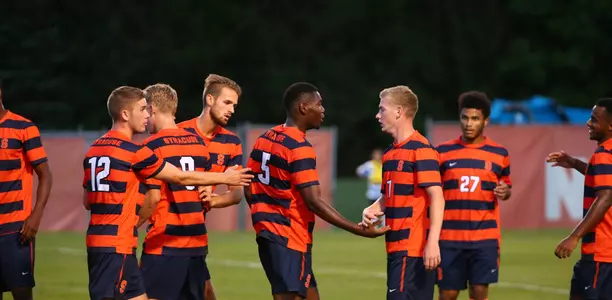 The Orange celebrate a goal.
