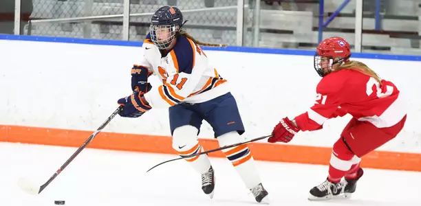Kelli Rowswell beats a Cornell defender
