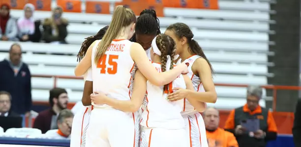 The Orange huddle against Clemson.
