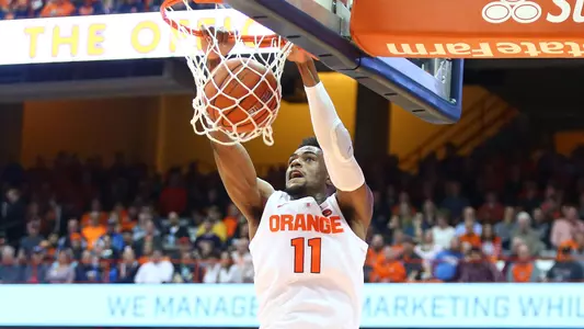 Oshae Brissett dunks.