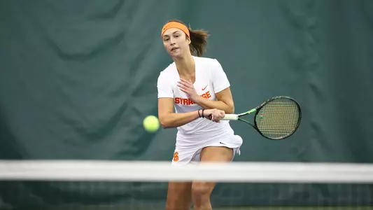 Tritou receives serve vs. Colgate