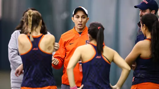 Head coach Younes Limam speaks to team postmatch