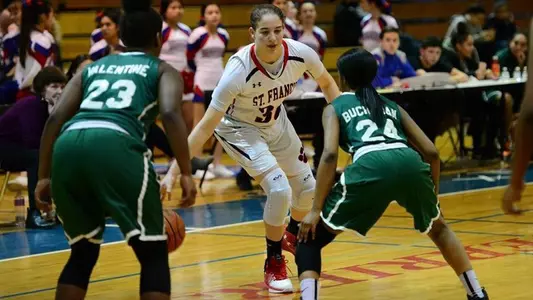 Emily Engstler dribbles down the court in a game for St. Francis Prep