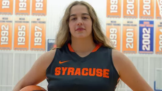 Emily Engstler poses on her visit to Syracuse.