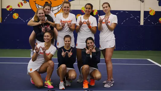 The Orange tennis team following their upset win over No. 3 Georgia Tech