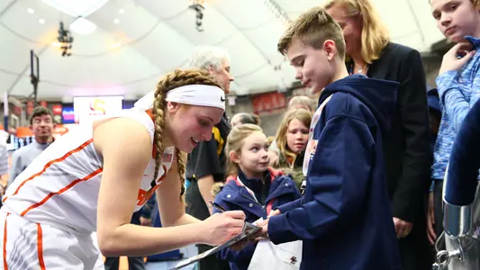Tiana Signing Autograph for a fan