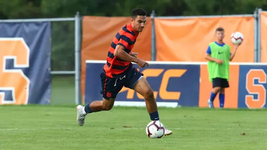 Massimo Ferrin moves the ball upfield against Canisius.