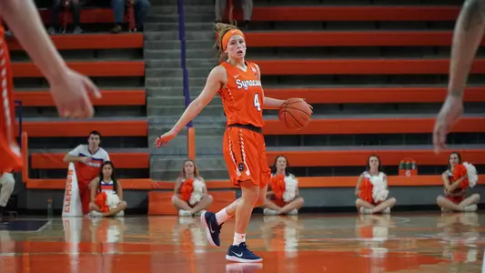 Tiana dribbles up the court at Clemson