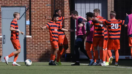The Orange celebrate the go-ahead goal at North Carolina.