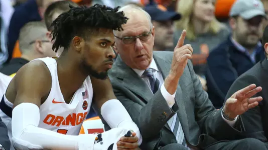 Coach Boeheim instructs freshman Quincy Guerrier.