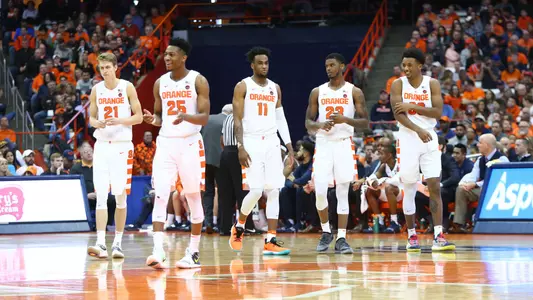 The Orange take the court.