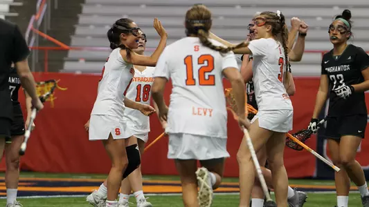 The Orange celebrate a goal against Binghamton.