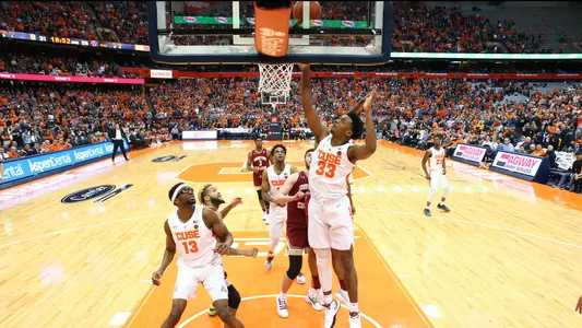 Elijah Hughes goes to the basket against Boston College.