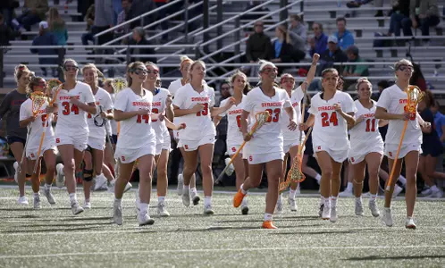 The Orange celebrate their ACC Tournament first-round victory.