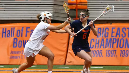 Kerry Defliese defends against the Cavaliers.