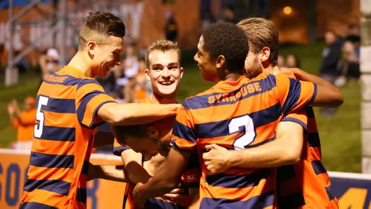 The Orange celebrate Simon Triantafillou's goal.