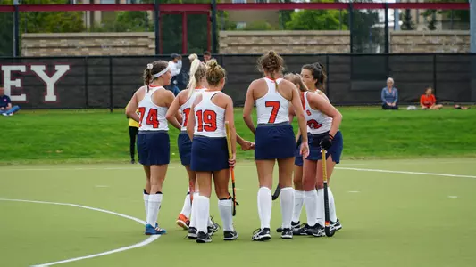 Field Hockey huddle at Cornell