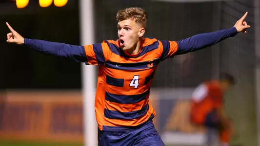 Noah Singelmann celebrates his game-winning goal against Cornell.