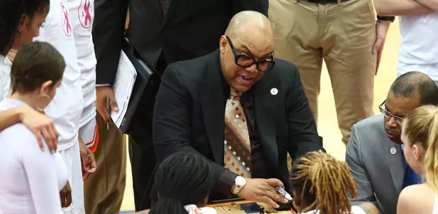 Coach Quentin Hillsman draws up a play.