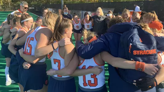 Team huddle after Penn State win