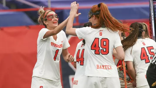 The Orange celebrate a goal against Stony Brook.