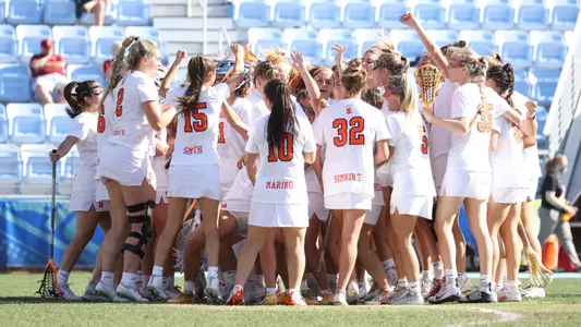 The Orange celebrate a victory at the ACC Tournament.
