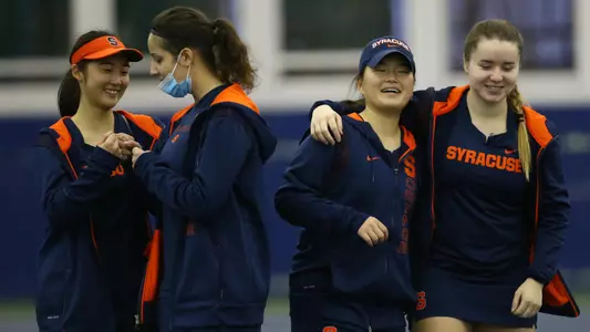 The Orange celebrate their win against Army.